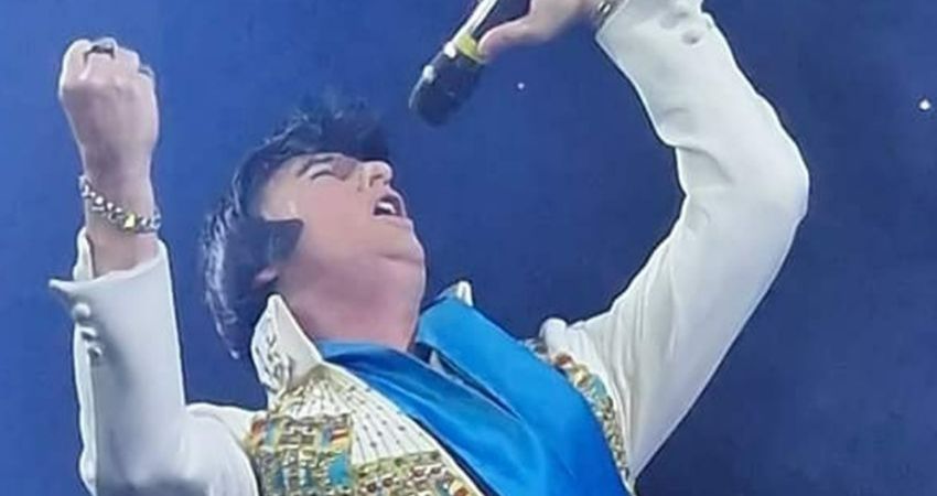 Andy James as Elvis 