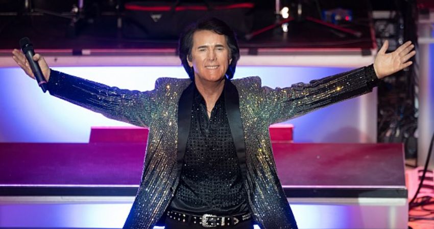 Fisher Stevens as Neil Diamond and Elvis